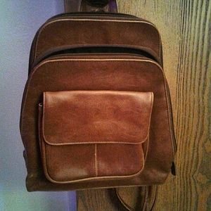Brown leather backpack purse by BayStudio with built-in wallet